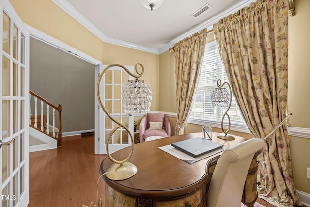 2505 Goldeneye Ct, Raleigh, NC 27606 - office with wood finished floors and ornamental molding