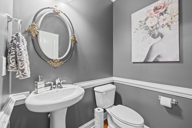 2505 Goldeneye Ct, Raleigh, NC 27606 - half bath featuring toilet and a sink