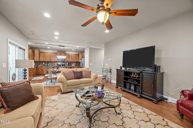 2505 Goldeneye Ct, Raleigh, NC 27606 - living area featuring recessed lighting, light wood-style floors, and ceiling fan