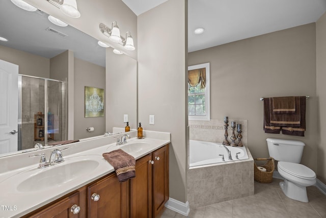 2505 Goldeneye Ct, Raleigh, NC 27606 - bathroom featuring double vanity, a bath, a shower stall, and tile patterned flooring