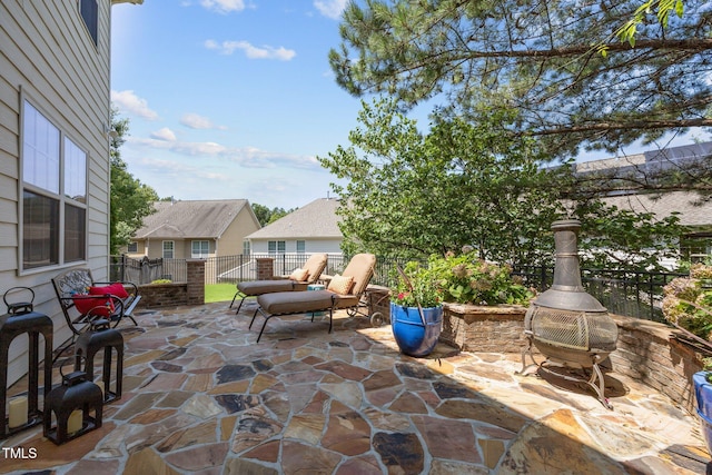 2505 Goldeneye Ct, Raleigh, NC 27606 - view of patio / terrace with a fire pit