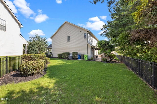 2505 Goldeneye Ct, Raleigh, NC 27606 - back of property with a fenced backyard