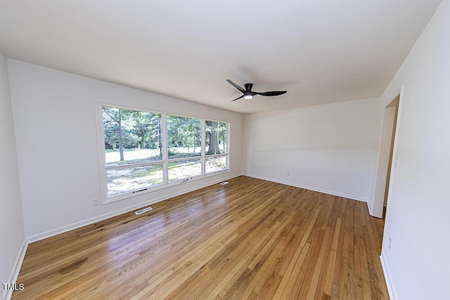 2309 Bertie Dr, Raleigh, NC 27610 - spare room with light wood-style floors and a ceiling fan