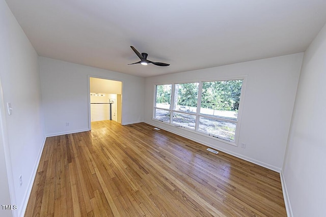 2309 Bertie Dr, Raleigh, NC 27610 - unfurnished room featuring light wood-type flooring and a ceiling fan