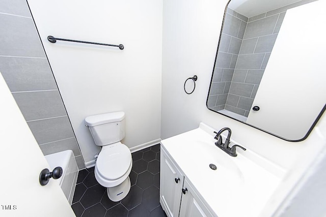 2309 Bertie Dr, Raleigh, NC 27610 - full bathroom featuring vanity, tile patterned floors, a tub, and a shower