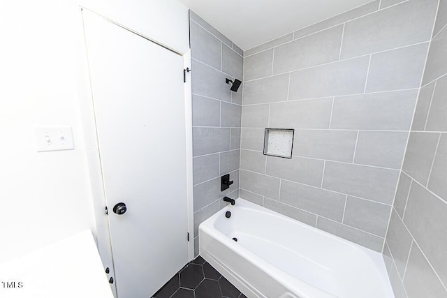 2309 Bertie Dr, Raleigh, NC 27610 - bathroom with shower / bath combination and tile patterned floors