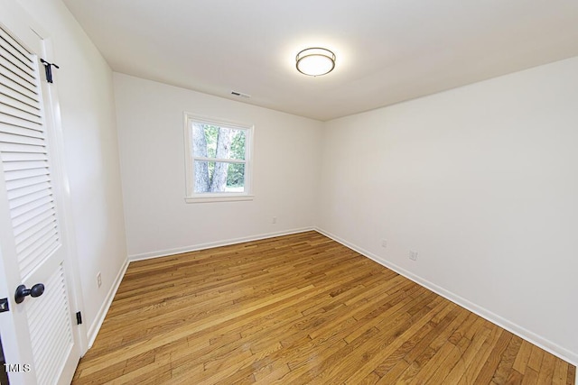 2309 Bertie Dr, Raleigh, NC 27610 - empty room with wood finished floors