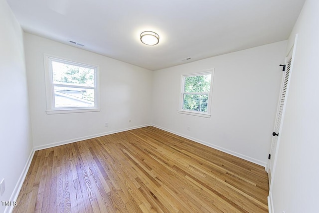 2309 Bertie Dr, Raleigh, NC 27610 - spare room with light wood finished floors and baseboards
