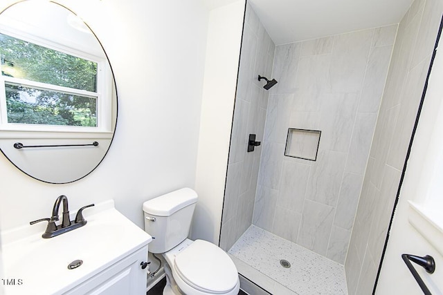 2309 Bertie Dr, Raleigh, NC 27610 - bathroom featuring vanity and tiled shower