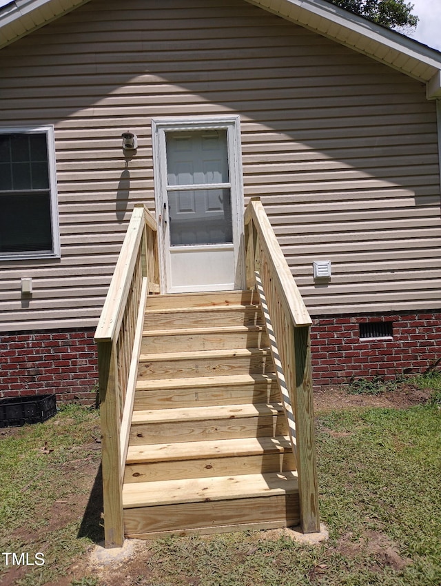 12719 S St, Whitakers, NC 27891 - doorway to property featuring crawl space