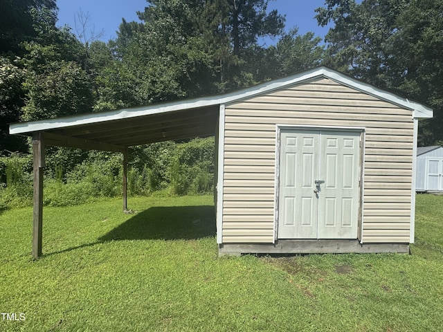 12719 S St, Whitakers, NC 27891 - view of shed with a carport