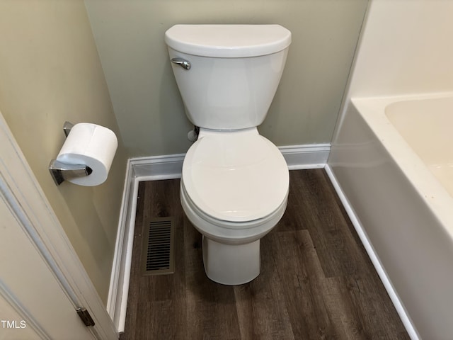 12719 S St, Whitakers, NC 27891 - full bath featuring wood finished floors and a tub to relax in