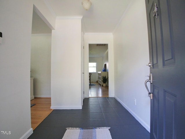 503 N Glen Dr, Raleigh, NC 27609 - foyer with crown molding and dark tile patterned flooring