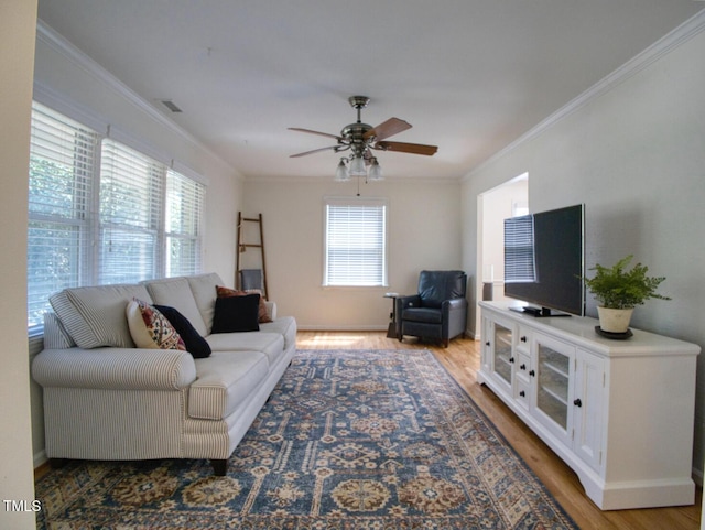 503 N Glen Dr, Raleigh, NC 27609 - living area with a ceiling fan, crown molding, and wood finished floors