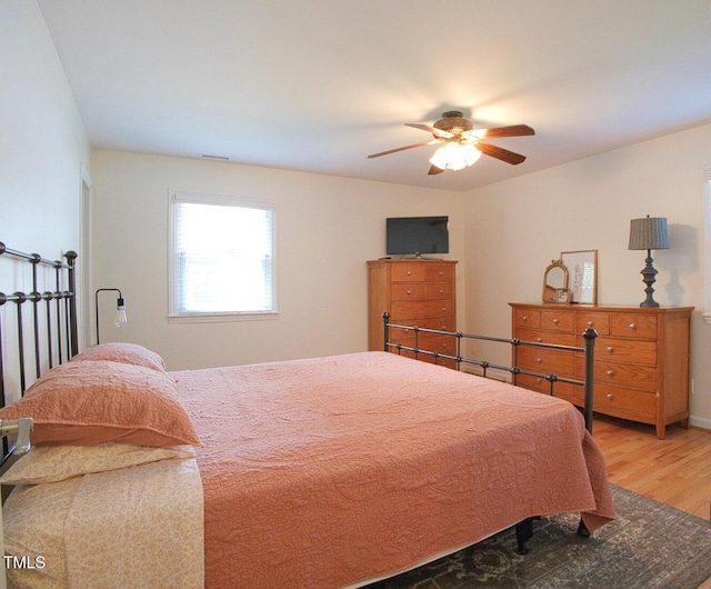 503 N Glen Dr, Raleigh, NC 27609 - bedroom with light wood-style flooring and ceiling fan