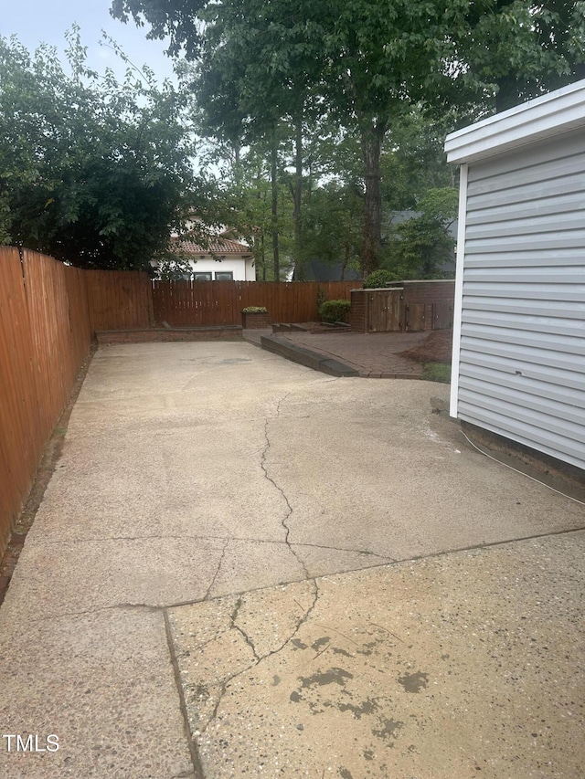 503 N Glen Dr, Raleigh, NC 27609 - fenced backyard featuring a patio area