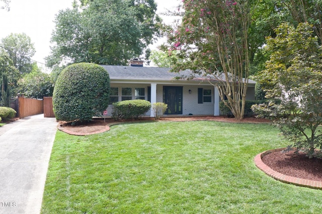 503 N Glen Dr, Raleigh, NC 27609 - ranch-style home with brick siding, a chimney, and concrete driveway