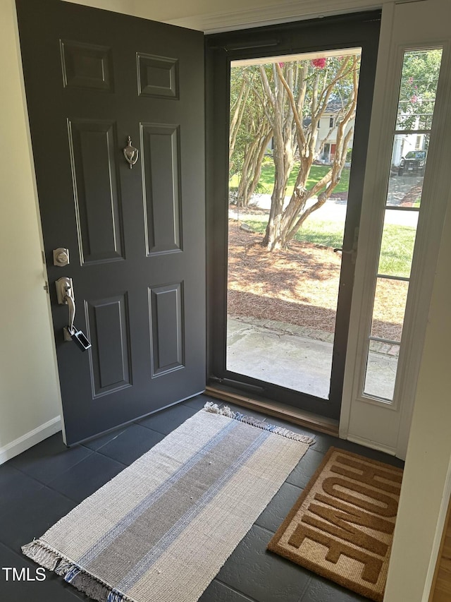 503 N Glen Dr, Raleigh, NC 27609 - foyer entrance featuring baseboards and tile patterned flooring