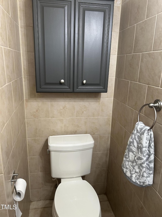 503 N Glen Dr, Raleigh, NC 27609 - bathroom featuring toilet and tile walls