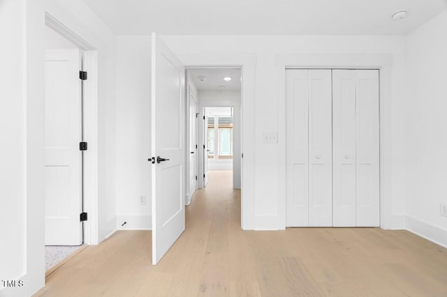 2 Seawell Ave Unit 101, Raleigh, NC 27601 - unfurnished bedroom featuring light wood-style floors, a closet, and recessed lighting