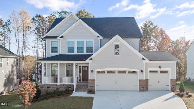 249 Dona Dr, Carthage, NC 28327 - view of front of property featuring a porch, brick siding, driveway, a shingled roof, and a front yard