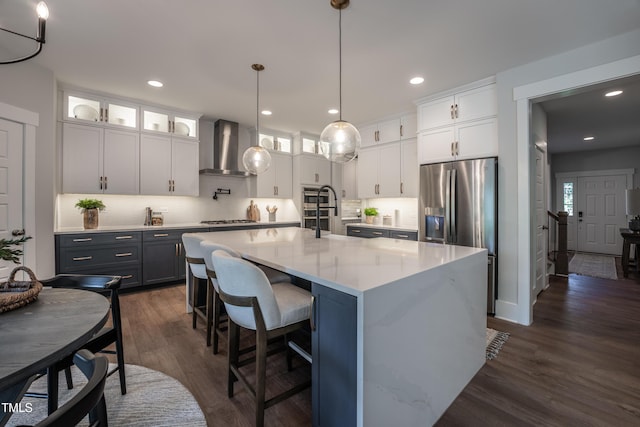 249 Dona Dr, Carthage, NC 28327 - kitchen with white cabinetry, tasteful backsplash, light countertops, dark wood-style flooring, and glass insert cabinets