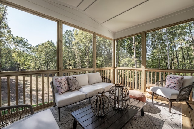 249 Dona Dr, Carthage, NC 28327 - sunroom featuring an outdoor living space, lofted ceiling, and view of wooded area