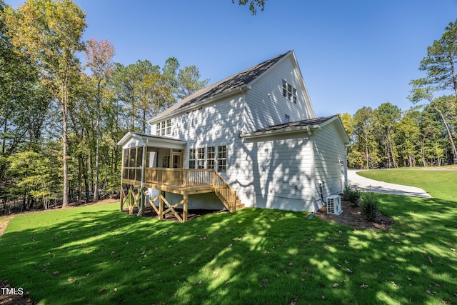 249 Dona Dr, Carthage, NC 28327 - rear view of property with a sunroom, a lawn, stairway, and a deck