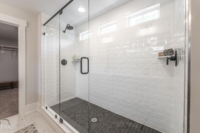 249 Dona Dr, Carthage, NC 28327 - full bath featuring plenty of natural light, a shower stall, a spacious closet, and marble look tile flooring