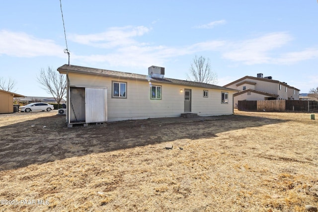 rear view of property featuring central air condition unit