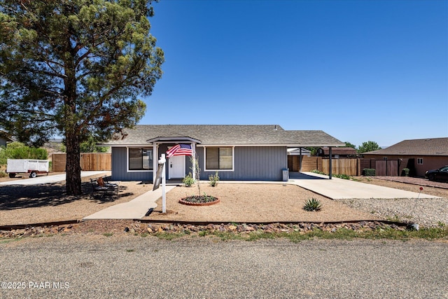13819 S Bluebird Ln, Mayer, AZ 86333 - ranch-style house with concrete driveway and a shingled roof