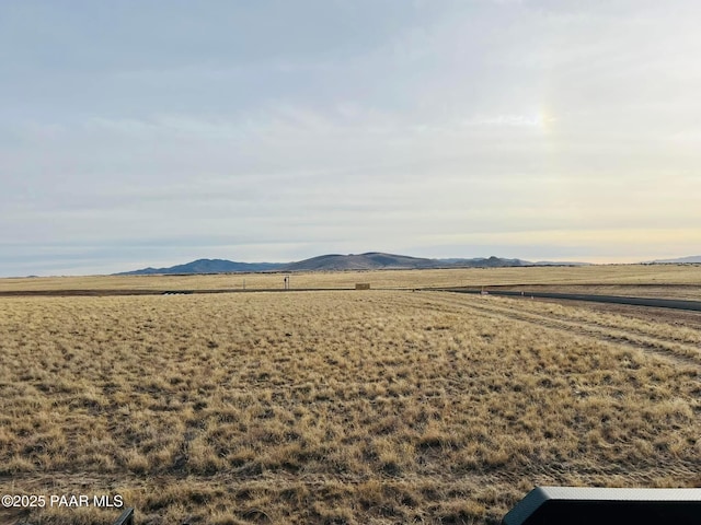 property view of mountains featuring a rural view