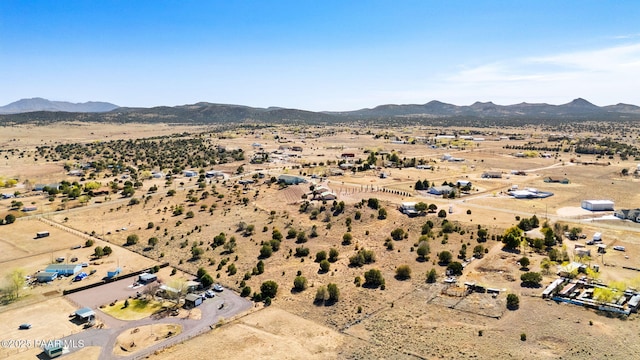 aerial view with a rural view, a mountain view, and view of desert