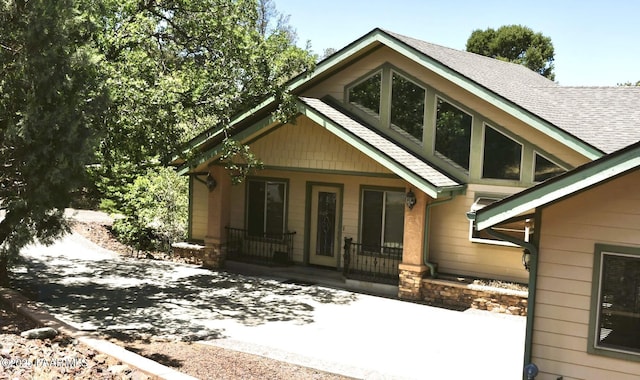 1284 Mcdonald Dr, Prescott, AZ 86303 - view of front of house with a porch and roof with shingles