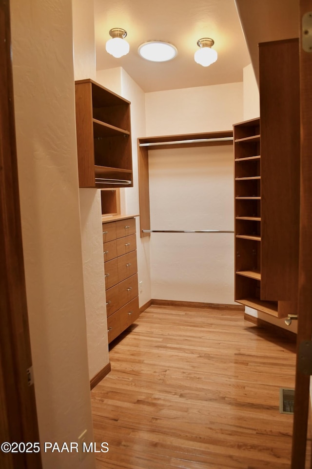 1284 Mcdonald Dr, Prescott, AZ 86303 - walk in closet with light wood-style floors