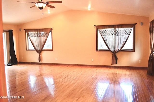 1284 Mcdonald Dr, Prescott, AZ 86303 - empty room with lofted ceiling, a ceiling fan, and hardwood / wood-style floors