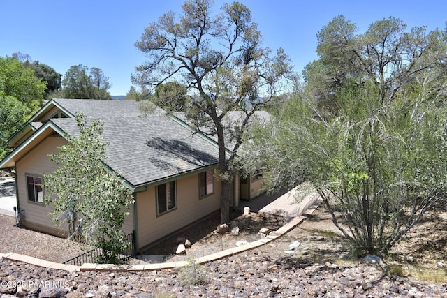 1284 Mcdonald Dr, Prescott, AZ 86303 - view of side of property featuring a shingled roof
