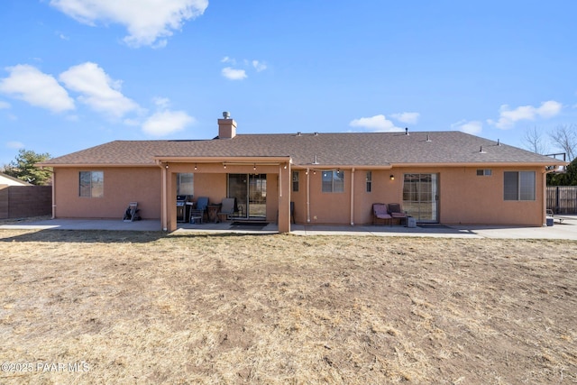 rear view of house with a patio area