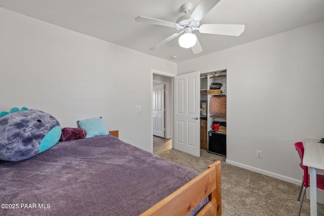 bedroom featuring ceiling fan and light colored carpet