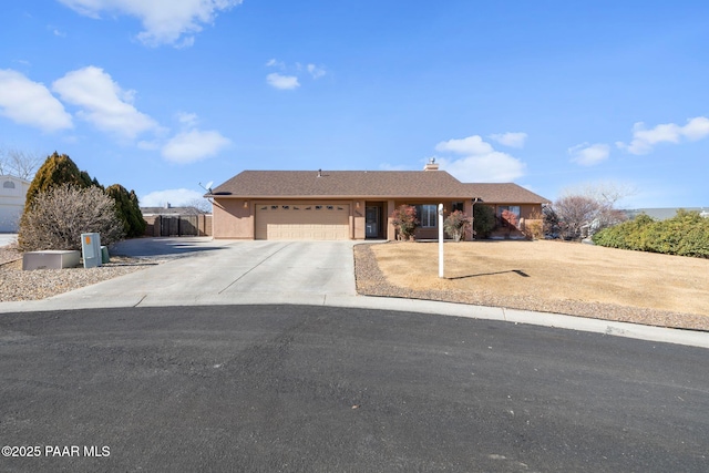 ranch-style home with a garage