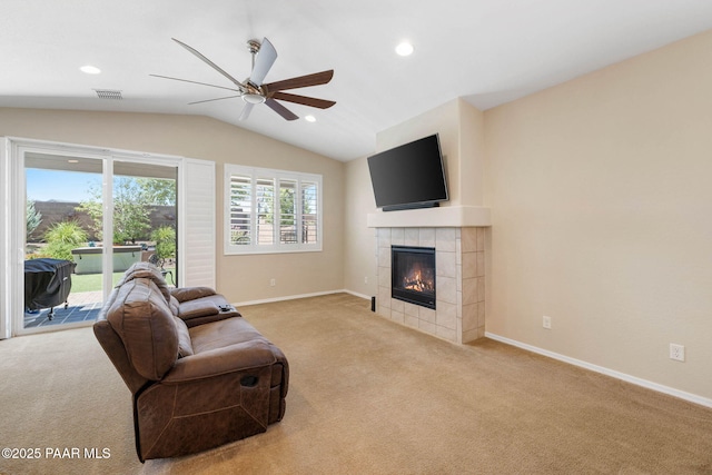 6214 Harvest Moon Ave, Prescott, AZ 86305 - carpeted living room featuring ceiling fan, lofted ceiling, a fireplace, and recessed lighting