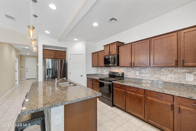 6214 Harvest Moon Ave, Prescott, AZ 86305 - kitchen with stainless steel appliances, light tile patterned flooring, tasteful backsplash, and recessed lighting