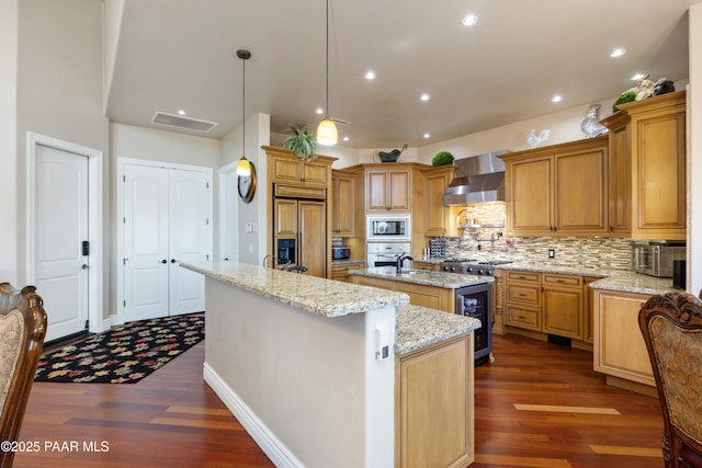 791 N Creekside Dr, Prescott, AZ 86303 - kitchen with built in appliances, a center island with sink, wall chimney range hood, dark wood finished floors, and wine cooler