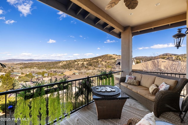 791 N Creekside Dr, Prescott, AZ 86303 - balcony with a mountain view, a ceiling fan, and outdoor lounge area