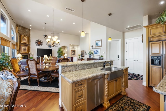 791 N Creekside Dr, Prescott, AZ 86303 - kitchen featuring dishwasher, paneled fridge, dark wood-style floors, a towering ceiling, and light stone counters