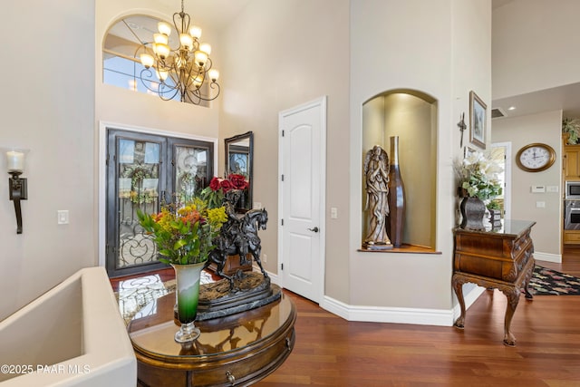 791 N Creekside Dr, Prescott, AZ 86303 - entryway featuring a high ceiling, wood finished floors, and a chandelier