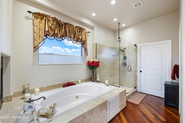 791 N Creekside Dr, Prescott, AZ 86303 - full bathroom featuring a stall shower, a jetted tub, recessed lighting, and wood finished floors