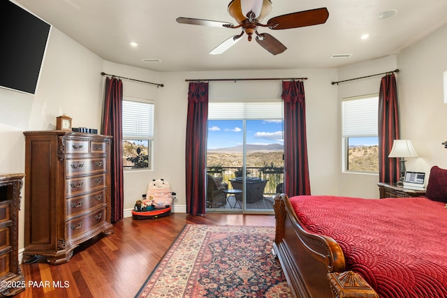 791 N Creekside Dr, Prescott, AZ 86303 - bedroom featuring wood finished floors, access to exterior, recessed lighting, a ceiling fan, and a mountain view