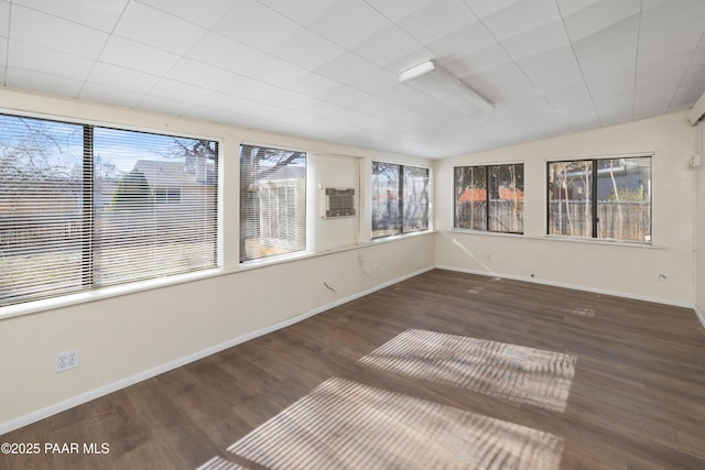 7869 Spouse Dr, Prescott Valley, AZ 86314 - unfurnished sunroom featuring plenty of natural light, wood finished floors, lofted ceiling, and a wooden deck