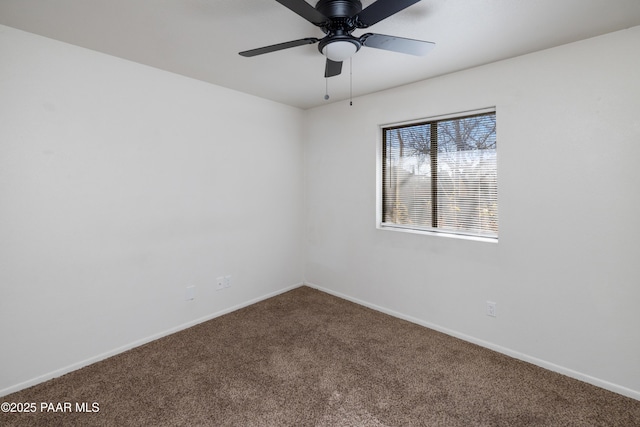 7869 Spouse Dr, Prescott Valley, AZ 86314 - spare room featuring carpet floors and a ceiling fan
